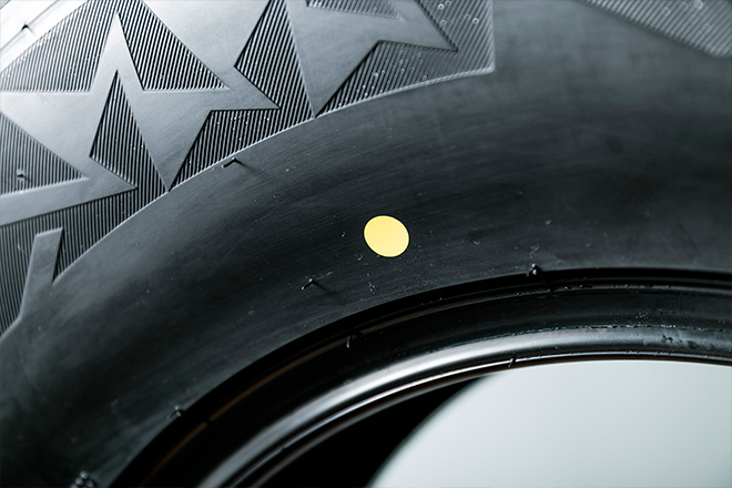 Yellow Dot Marking the Tire's High Point for Match Mounting